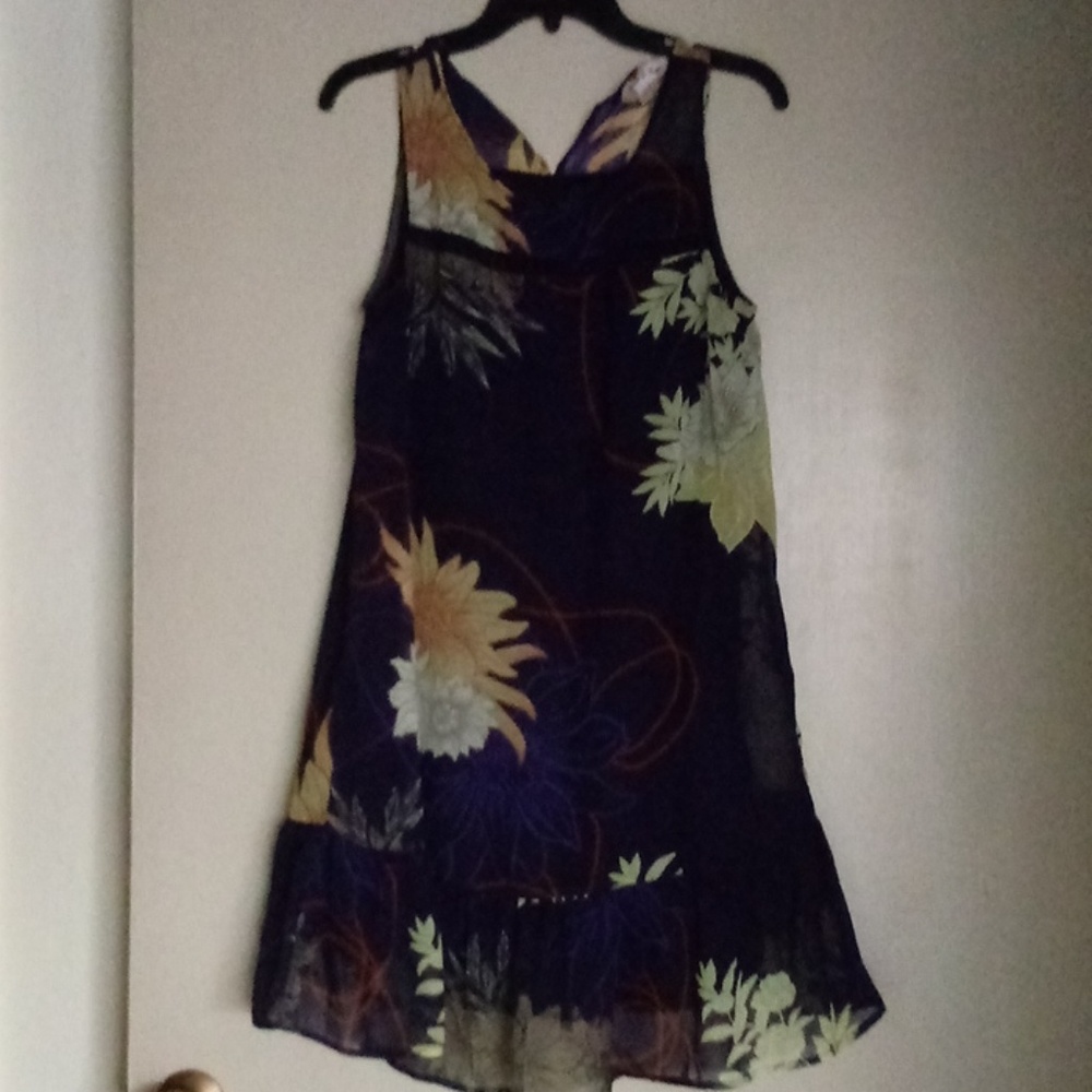 Fun flowy sundress.Fun with sandles or dress up wi
